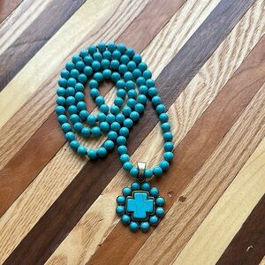 Blue Beaded Necklace with Sunburst Pendant